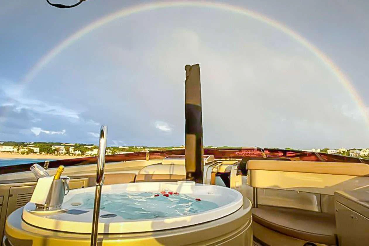 a view of a city from a boat aboard YCM 120 Yacht for Charter