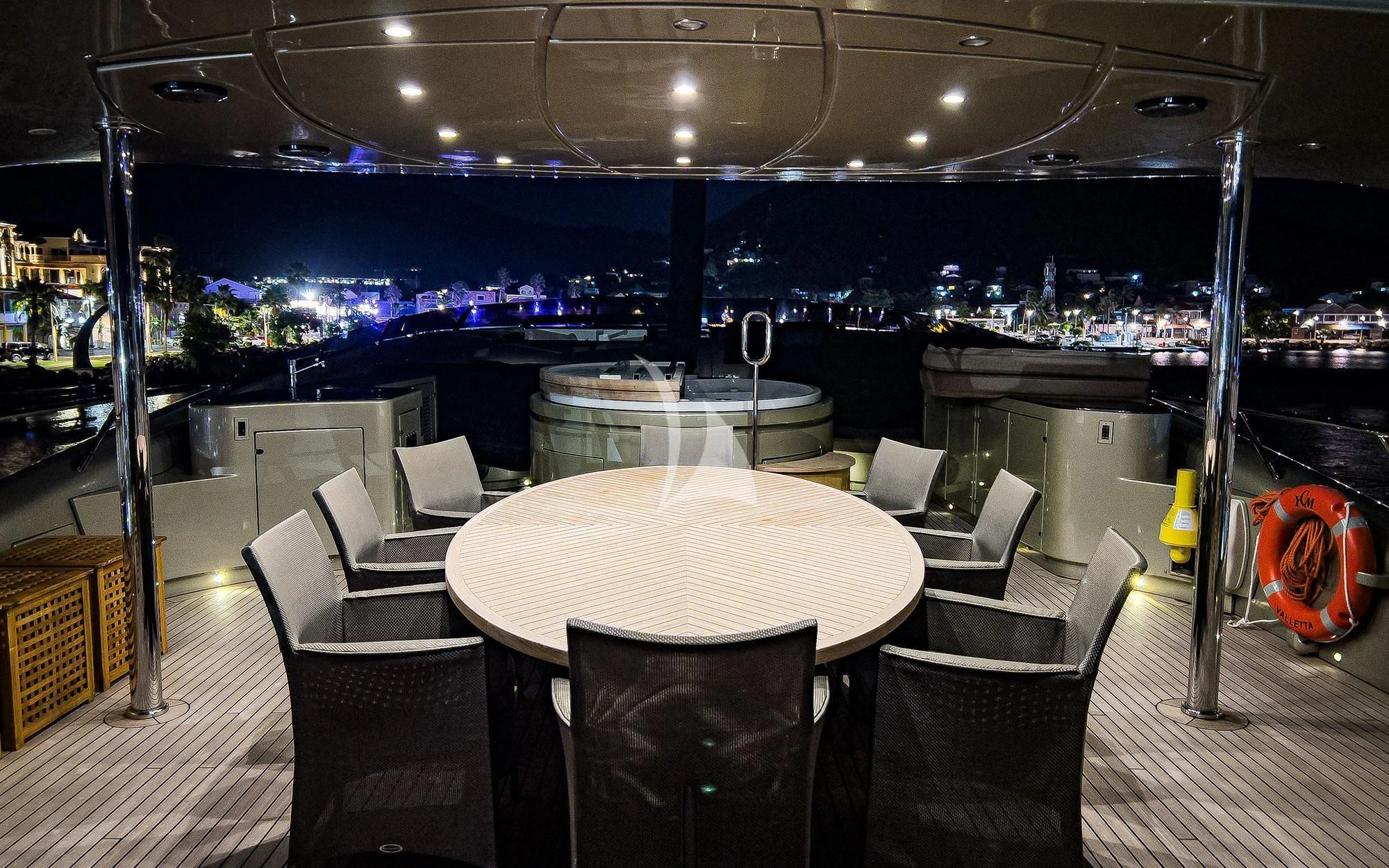 a table set for a dinner party aboard YCM 120 Yacht for Charter