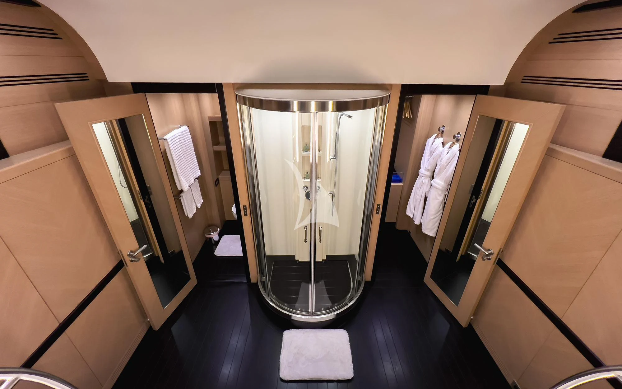 a bathroom with a large mirror aboard YCM 120 Yacht for Charter