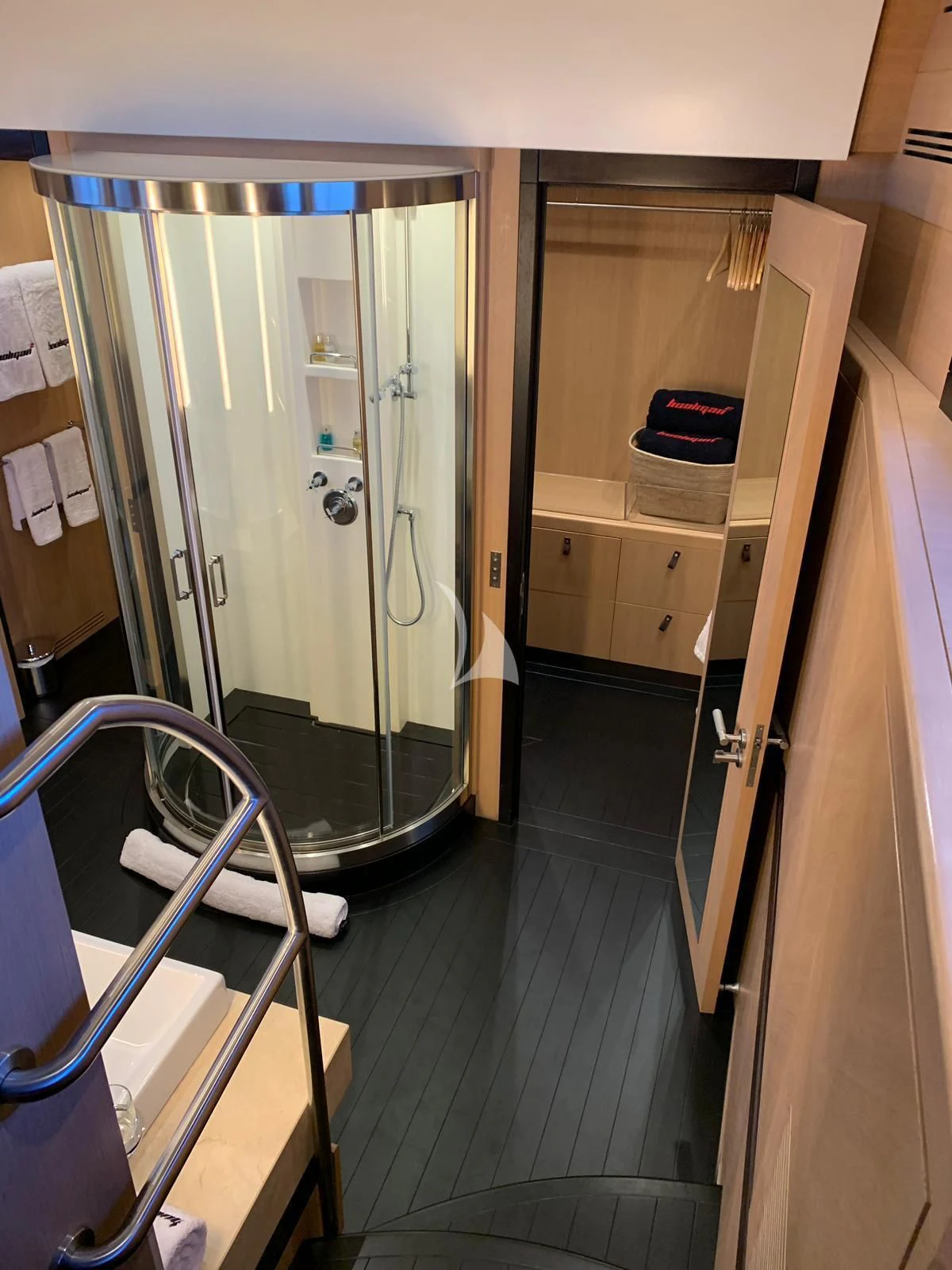 a shower unit in a bathroom aboard YCM 120 Yacht for Charter