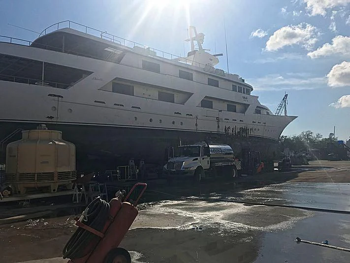 a large ship docked aboard CONSERVATION Yacht for Sale