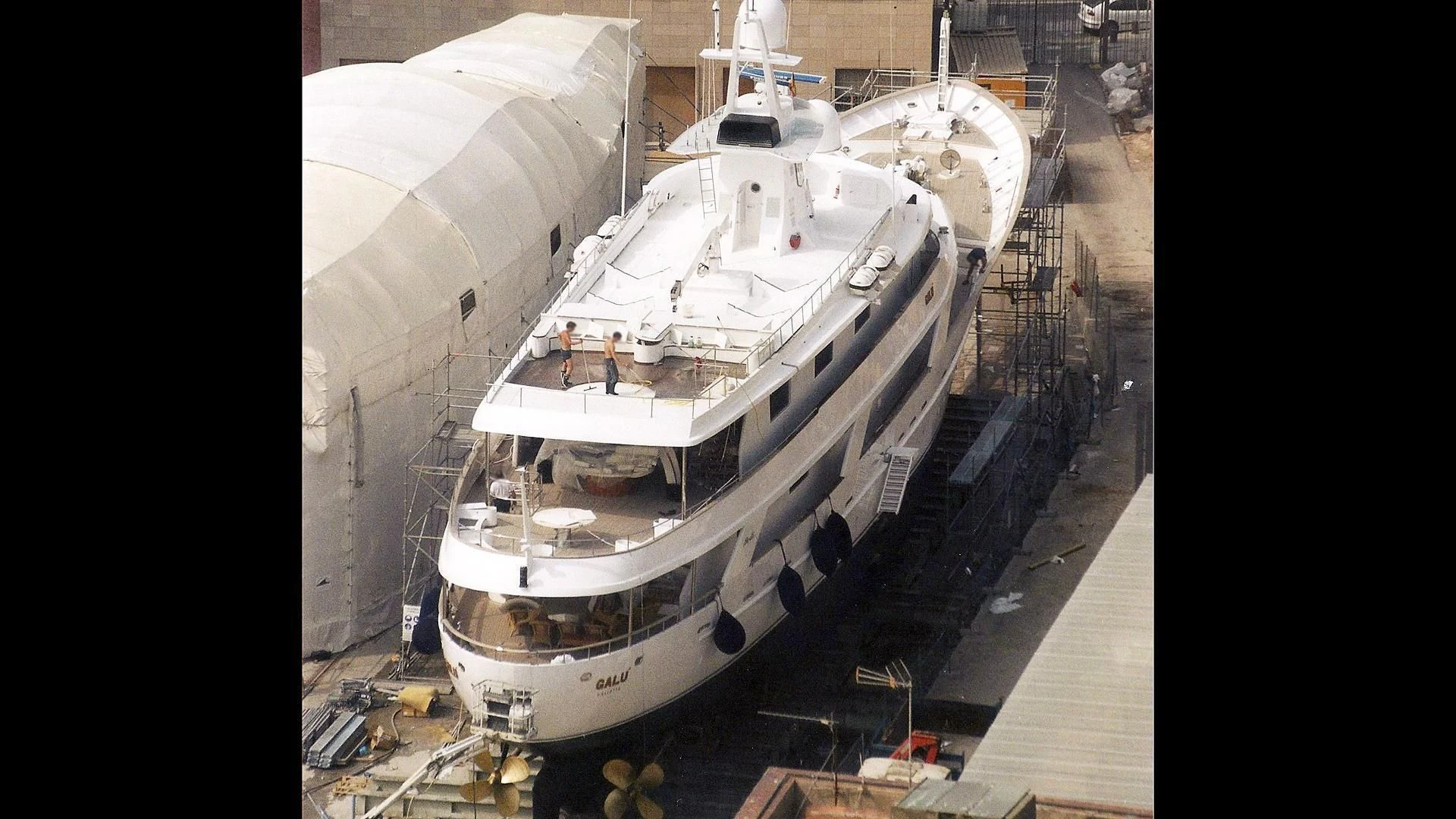 a large ship in a harbor aboard CONSERVATION Yacht for Sale