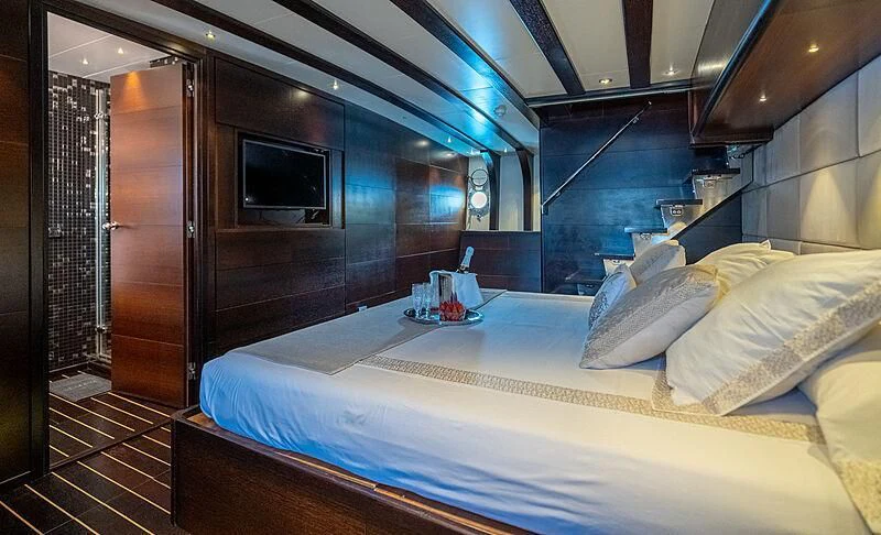 a bed in a room aboard SEMAYA Yacht for Sale