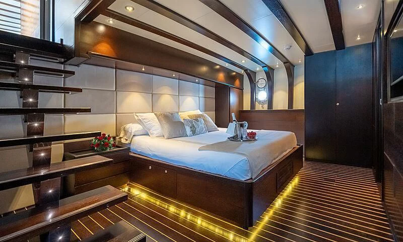 a bed in a room aboard SEMAYA Yacht for Sale
