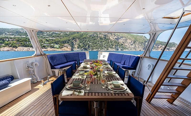a dining table on a boat aboard SEMAYA Yacht for Sale