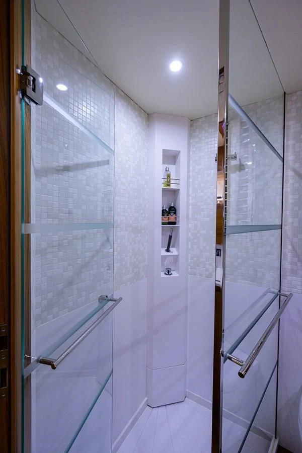 a shower with glass doors aboard SOCIAL DISTANCING Yacht for Sale