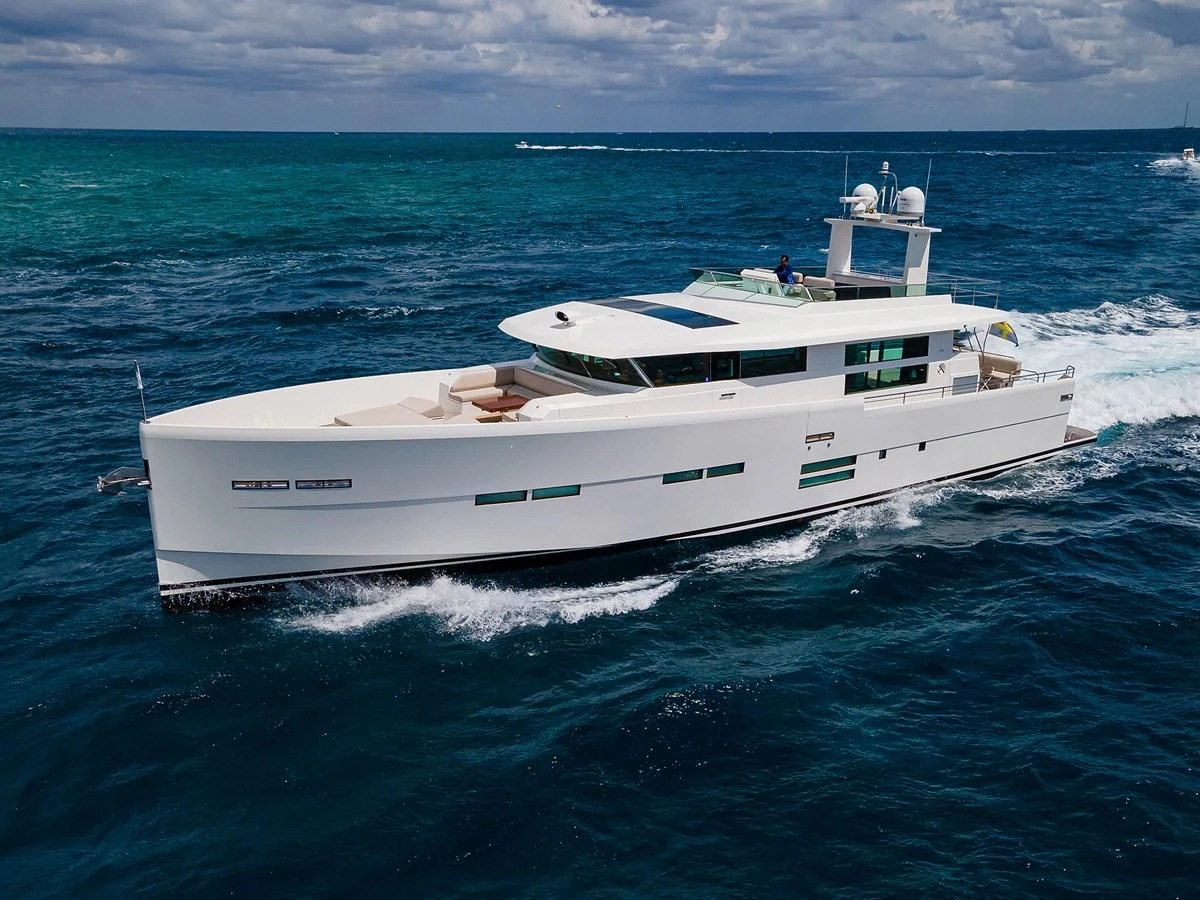 a white boat in the water aboard SOCIAL DISTANCING Yacht for Sale