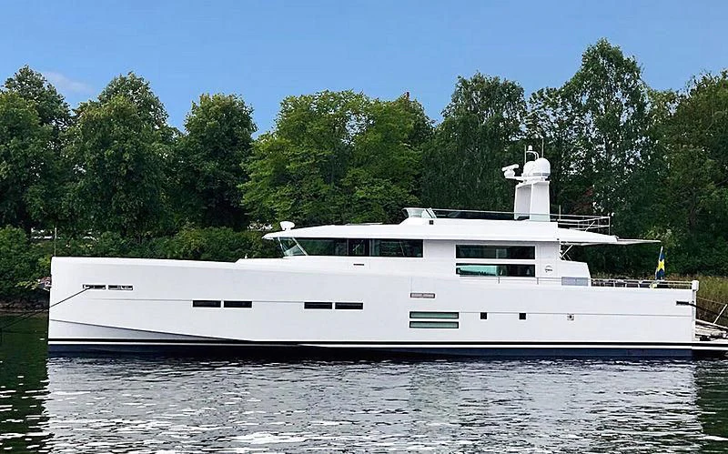 a white boat on water aboard SOCIAL DISTANCING Yacht for Sale
