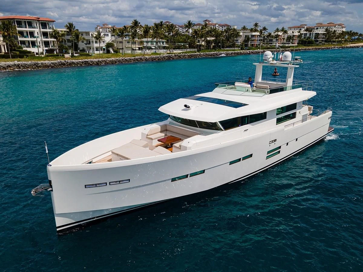 a white boat in the water aboard SOCIAL DISTANCING Yacht for Sale
