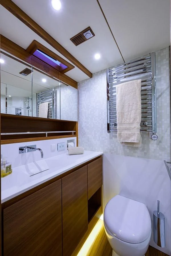 a bathroom with a sink and a toilet aboard SOCIAL DISTANCING Yacht for Sale