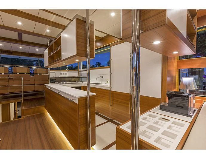 a large room with a staircase and a large metal ladder aboard SOCIAL DISTANCING Yacht for Sale