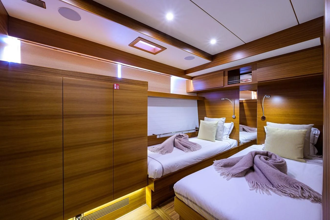 a room with a bed and a television aboard SOCIAL DISTANCING Yacht for Sale
