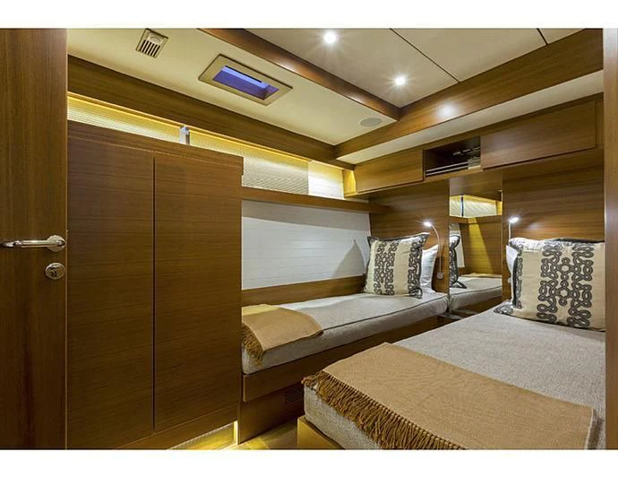 a room with a bed and a door aboard SOCIAL DISTANCING Yacht for Sale
