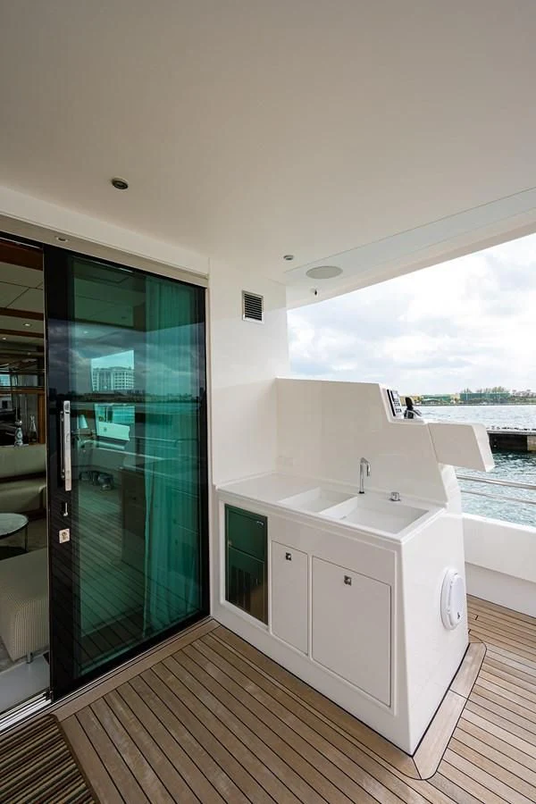 a room with a large window and a view of the ocean aboard SOCIAL DISTANCING Yacht for Sale