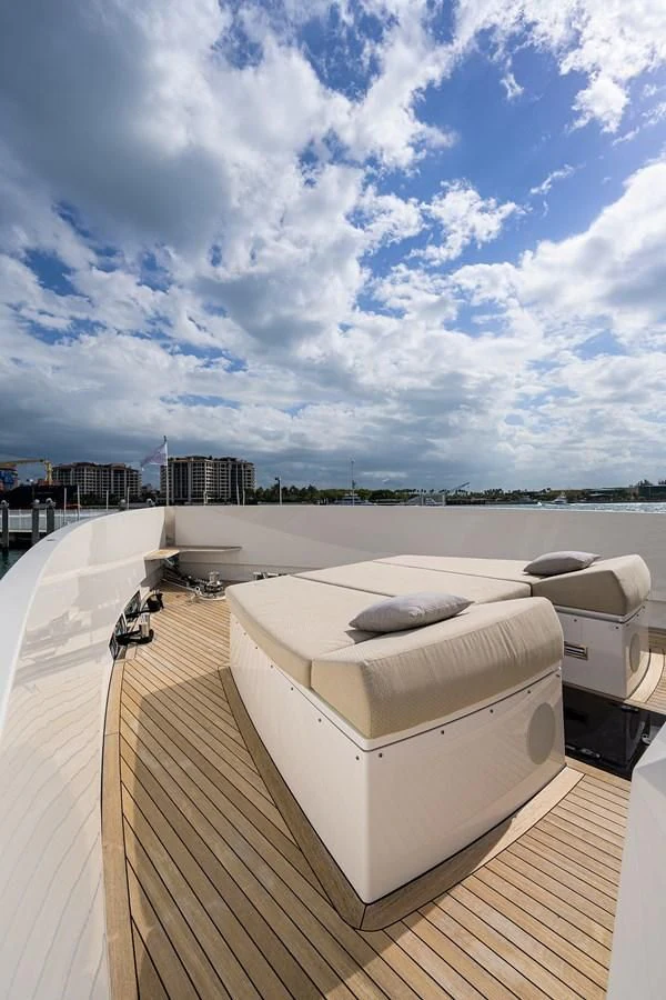 a large white boat on a deck aboard SOCIAL DISTANCING Yacht for Sale