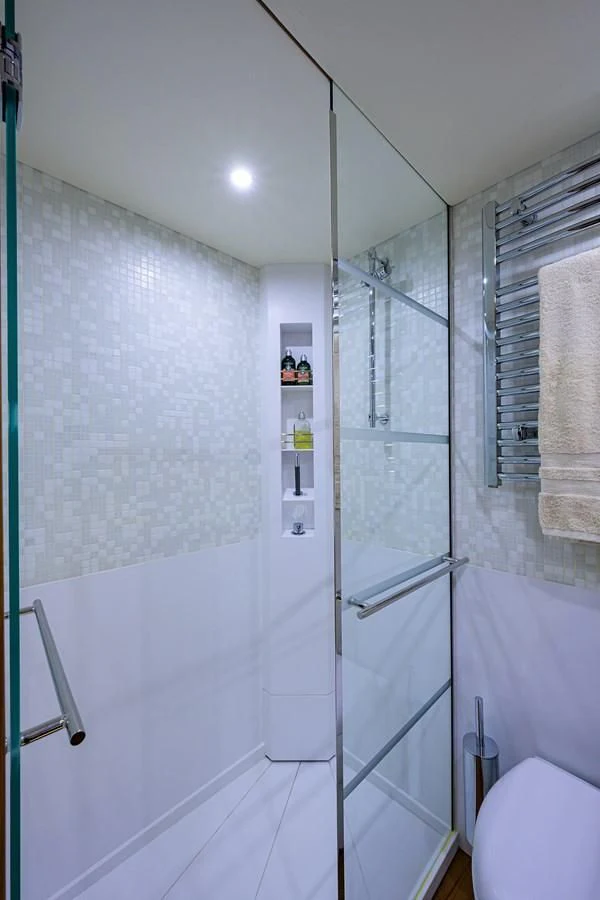 a bathroom with a glass shower aboard SOCIAL DISTANCING Yacht for Sale