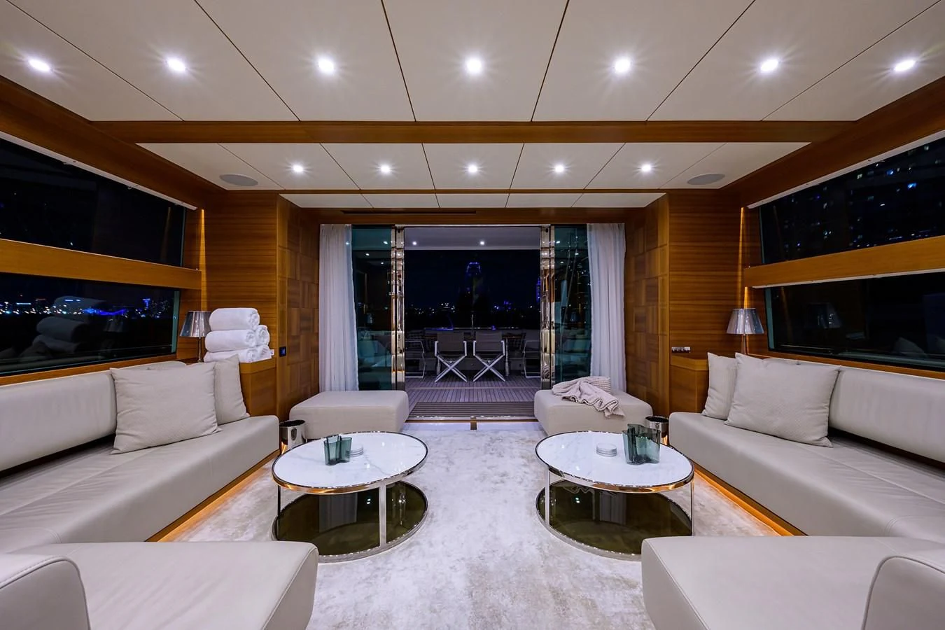 a living room with a large screen aboard SOCIAL DISTANCING Yacht for Sale