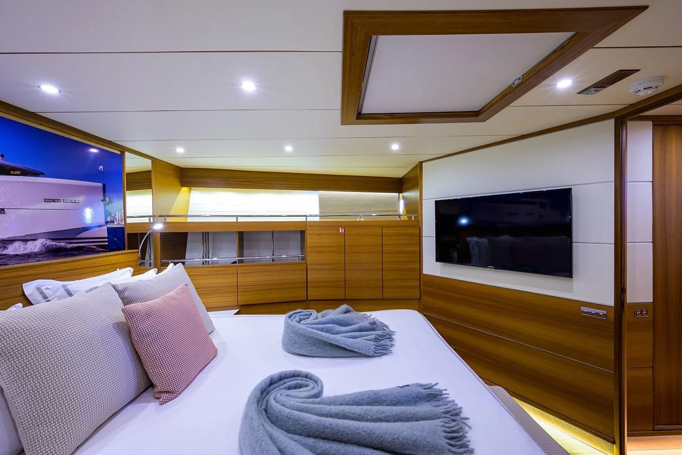 a room with a bed and a television aboard SOCIAL DISTANCING Yacht for Sale