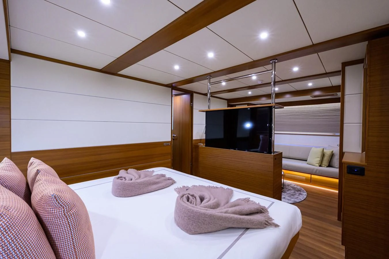 a modern bedroom with a large bed aboard SOCIAL DISTANCING Yacht for Sale