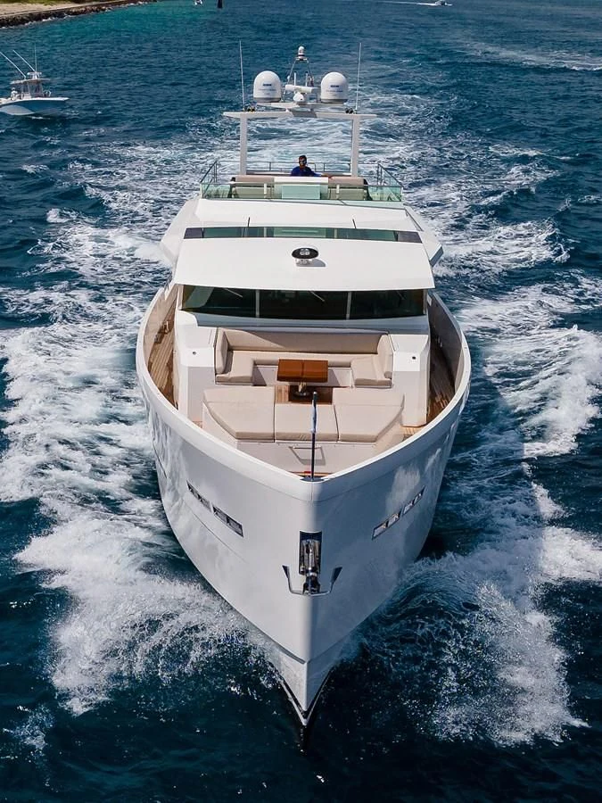 a white boat in the water aboard SOCIAL DISTANCING Yacht for Sale