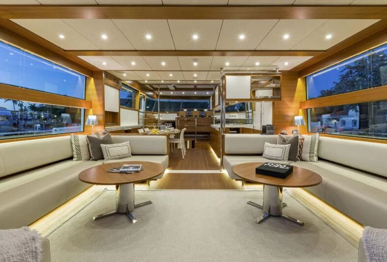 a living room with a couch and a coffee table aboard SOCIAL DISTANCING Yacht for Sale