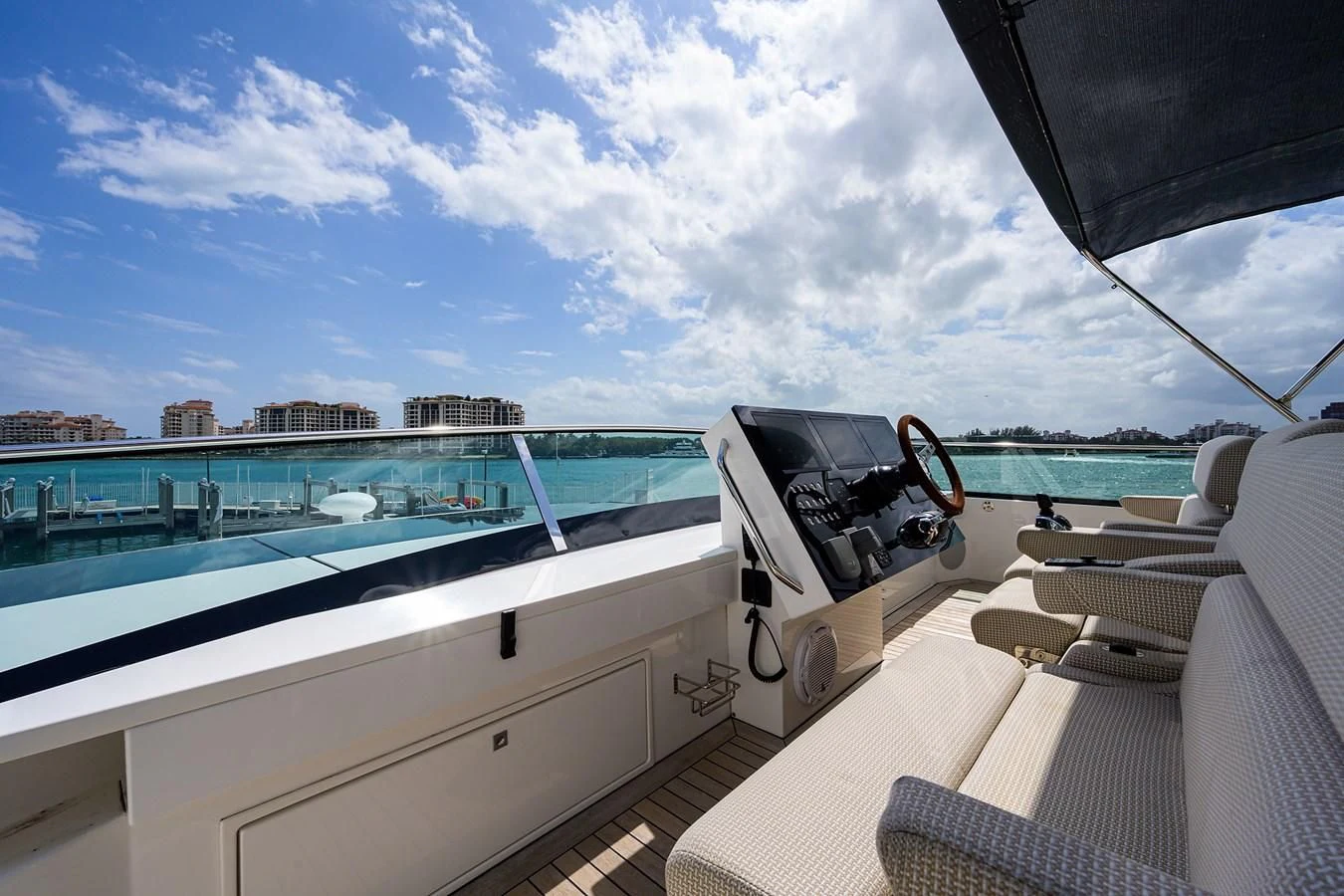a deck with a chair and a laptop on it aboard SOCIAL DISTANCING Yacht for Sale