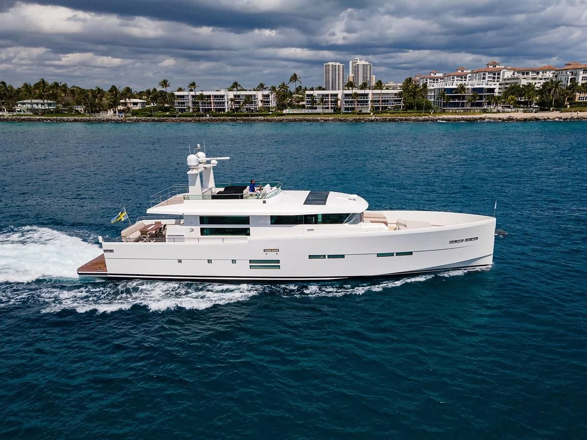 a white boat on the water aboard SOCIAL DISTANCING Yacht for Sale