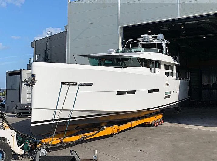 a large white boat aboard SOCIAL DISTANCING Yacht for Sale