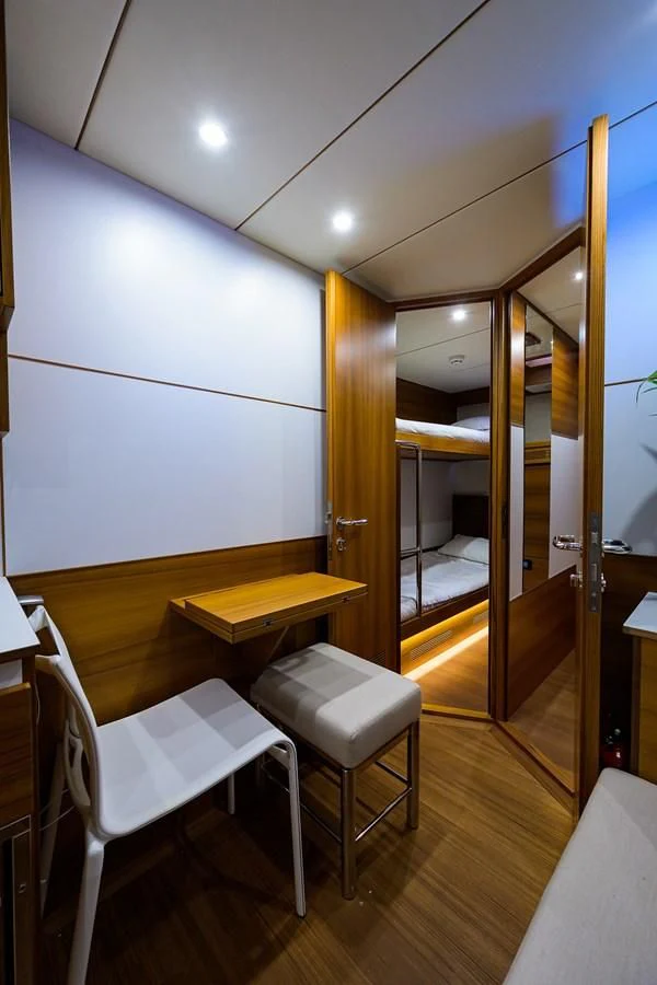 a room with a desk and a chair aboard SOCIAL DISTANCING Yacht for Sale