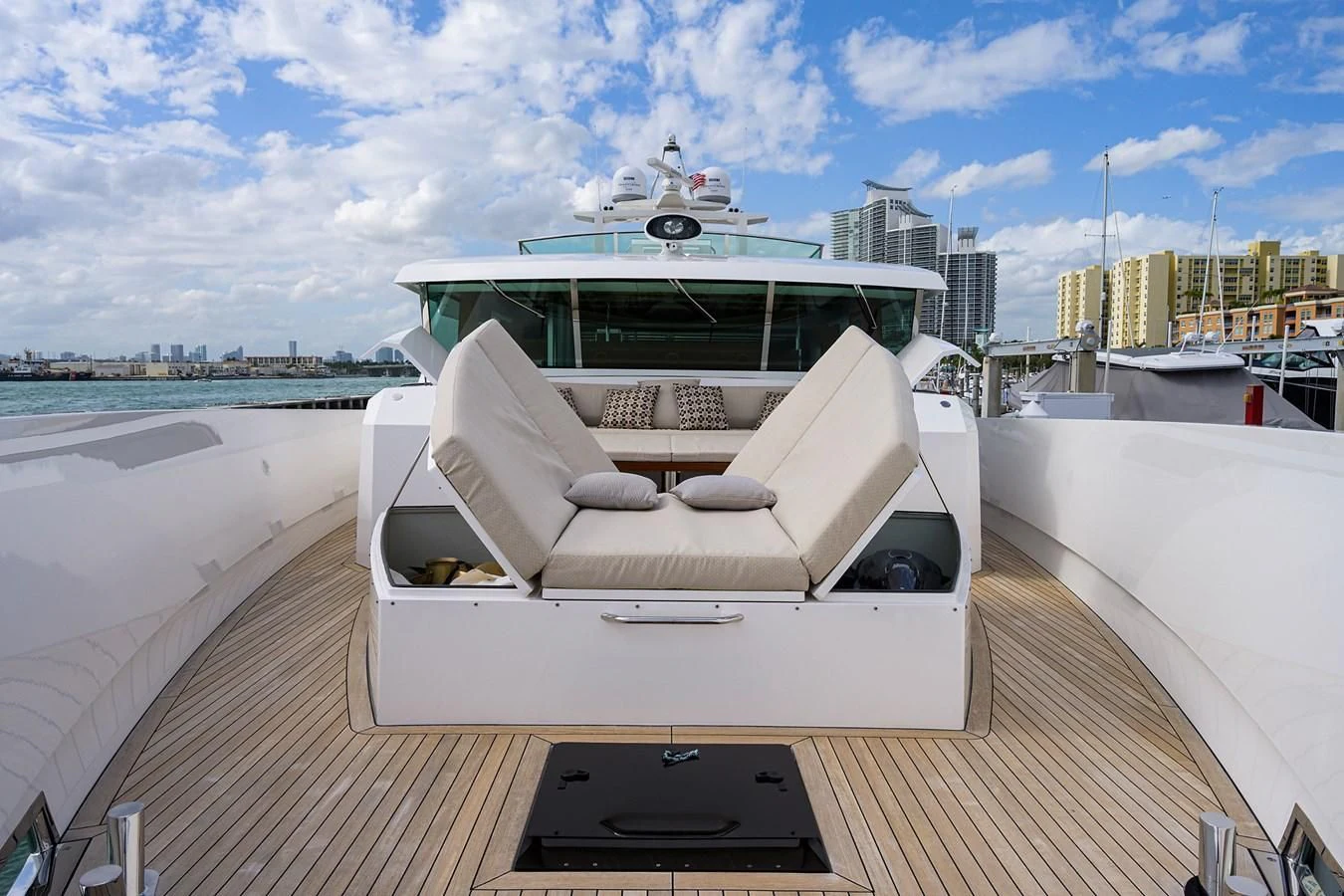 a white lounge chair on a boat aboard SOCIAL DISTANCING Yacht for Sale