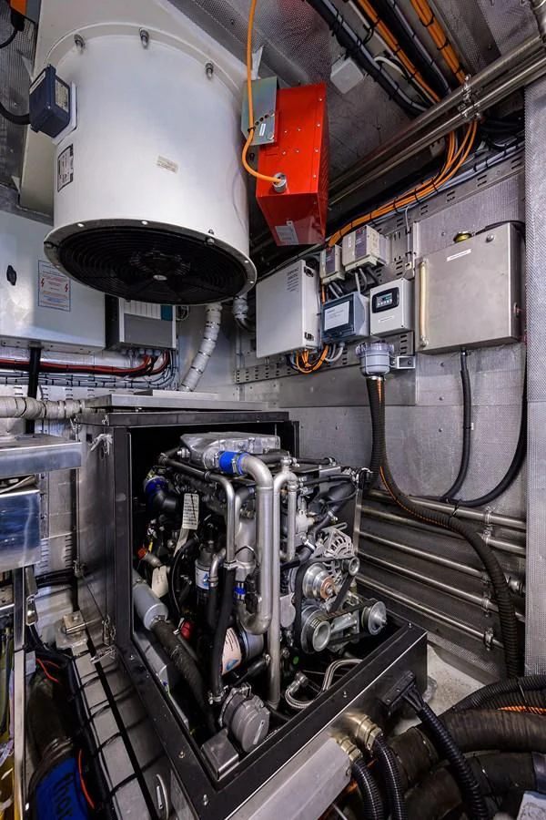 a machine with a large piece of equipment in it aboard SOCIAL DISTANCING Yacht for Sale