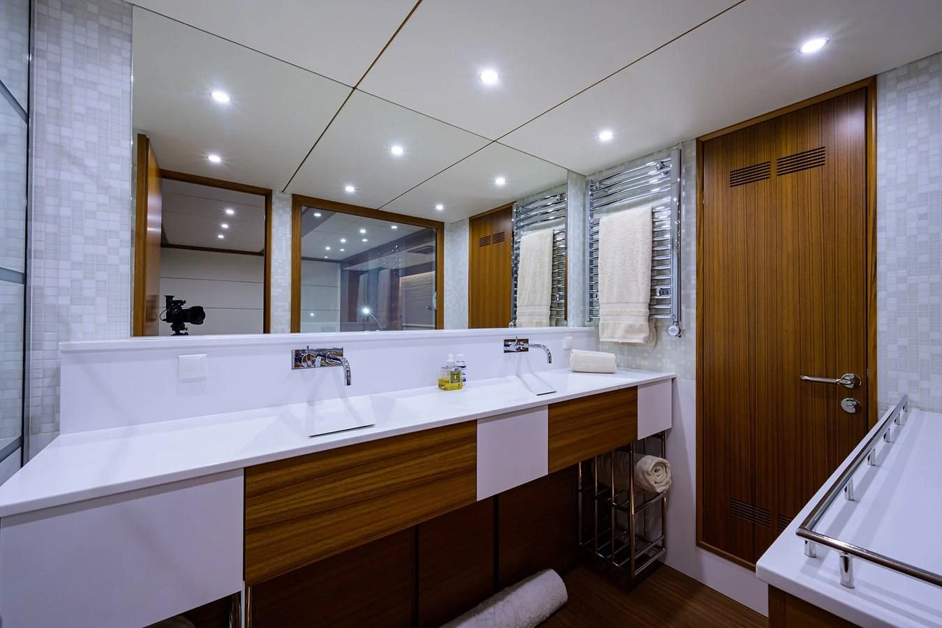 a bathroom with a large mirror aboard SOCIAL DISTANCING Yacht for Sale