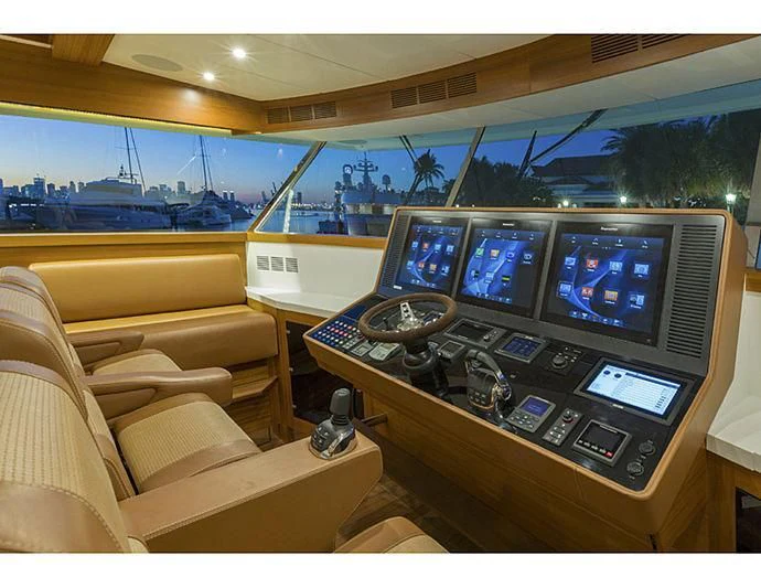 a control room with several monitors aboard SOCIAL DISTANCING Yacht for Sale