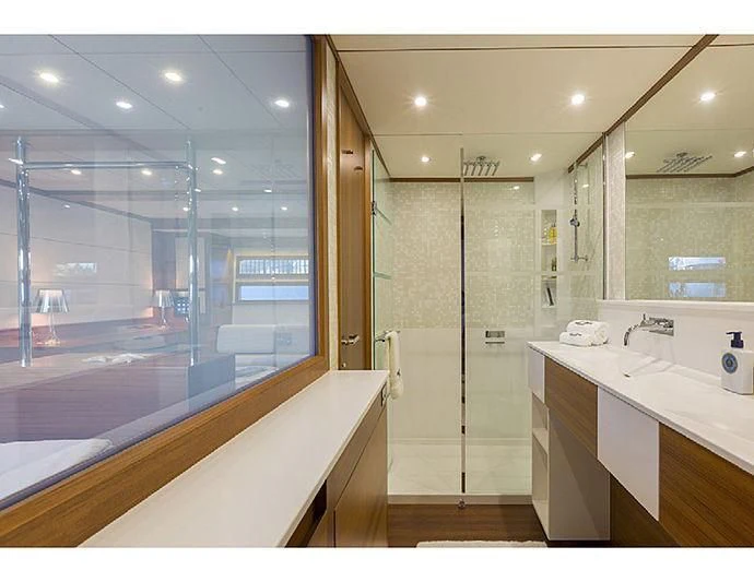 a bathroom with a glass shower aboard SOCIAL DISTANCING Yacht for Sale