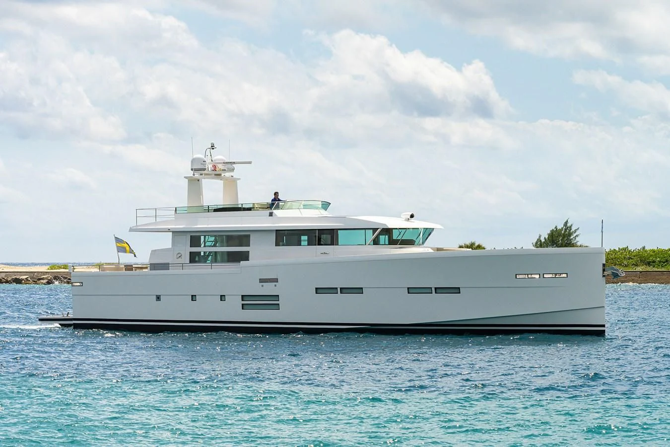 a white boat in the water aboard SOCIAL DISTANCING Yacht for Sale