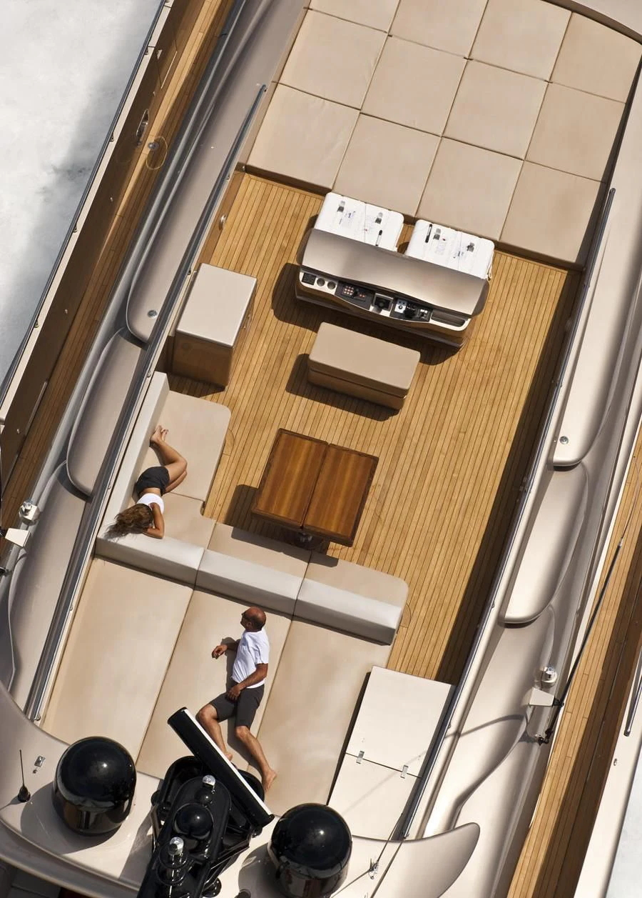a person standing in a room aboard MUSA Yacht for Sale