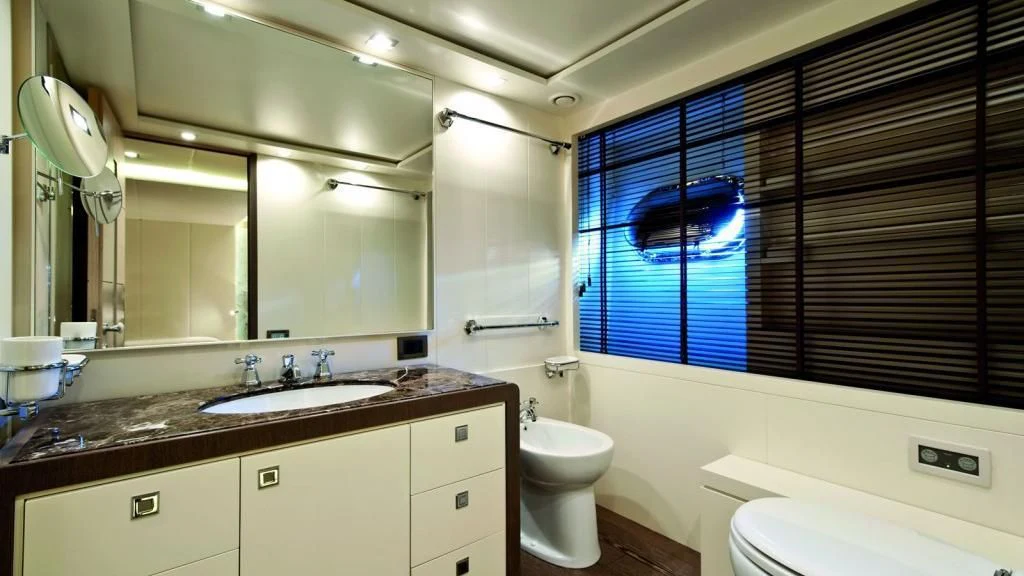 a bathroom with a sink and a toilet aboard MUSA Yacht for Sale