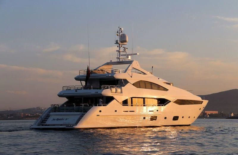 a large white ship in the water aboard SEA RAIDER V Yacht for Sale