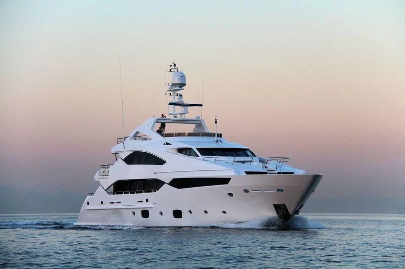 a white boat in the water aboard SEA RAIDER V Yacht for Sale