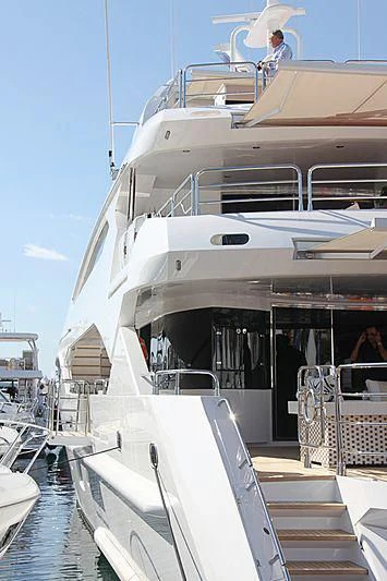 a boat with a couple people on it aboard SEA RAIDER V Yacht for Sale