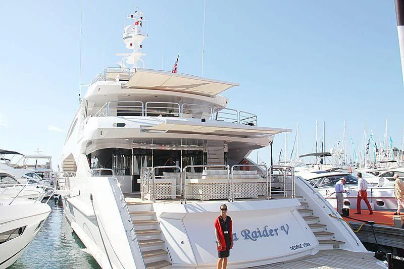 a large cruise ship docked aboard SEA RAIDER V Yacht for Sale