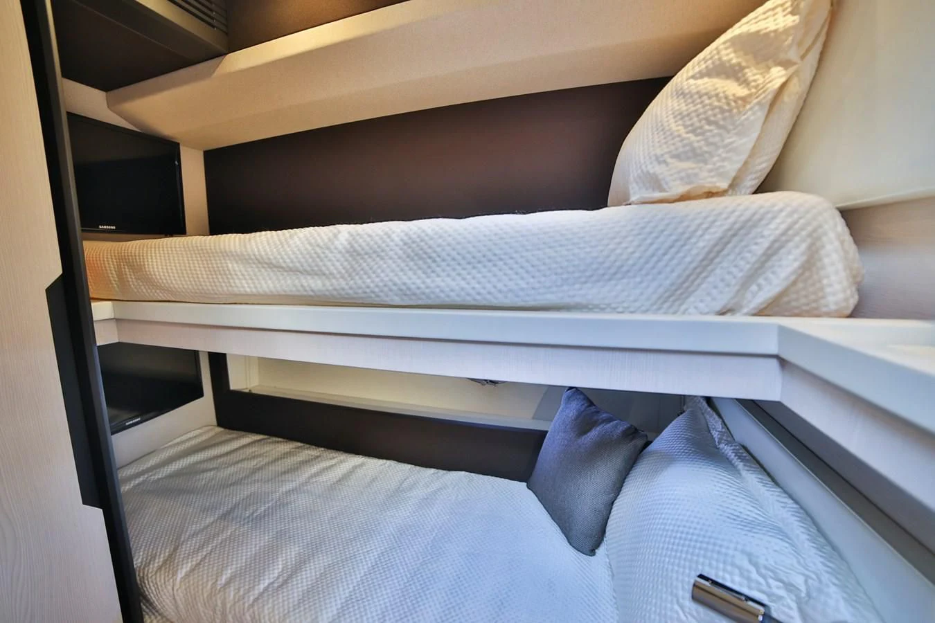 a bed with white sheets aboard SIRONA JOANNAH Yacht for Sale