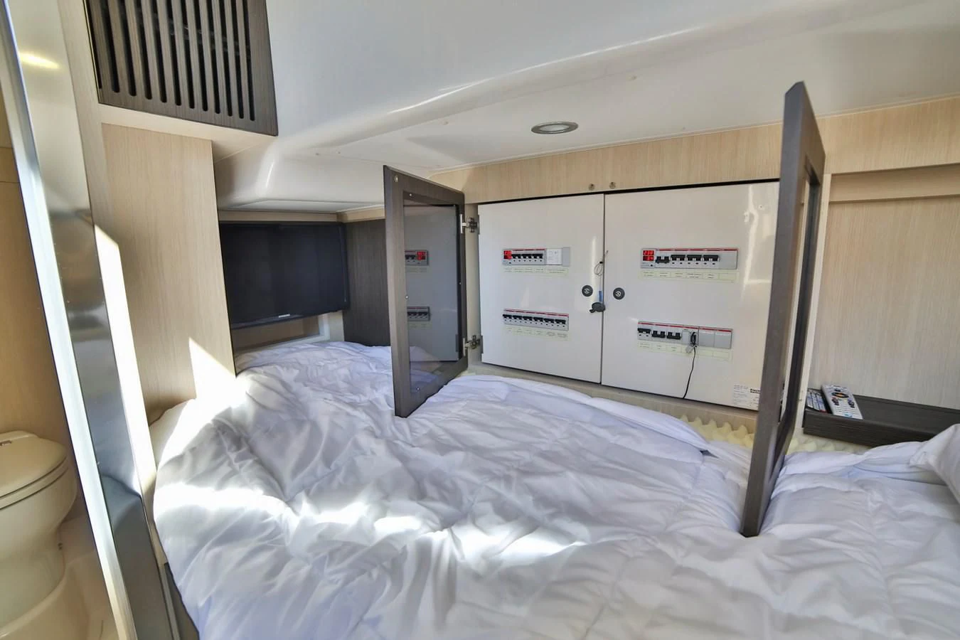a bed in a room aboard SIRONA JOANNAH Yacht for Sale