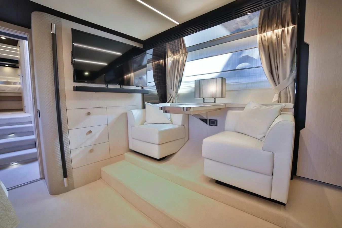 a room with a desk and a bed aboard SIRONA JOANNAH Yacht for Sale