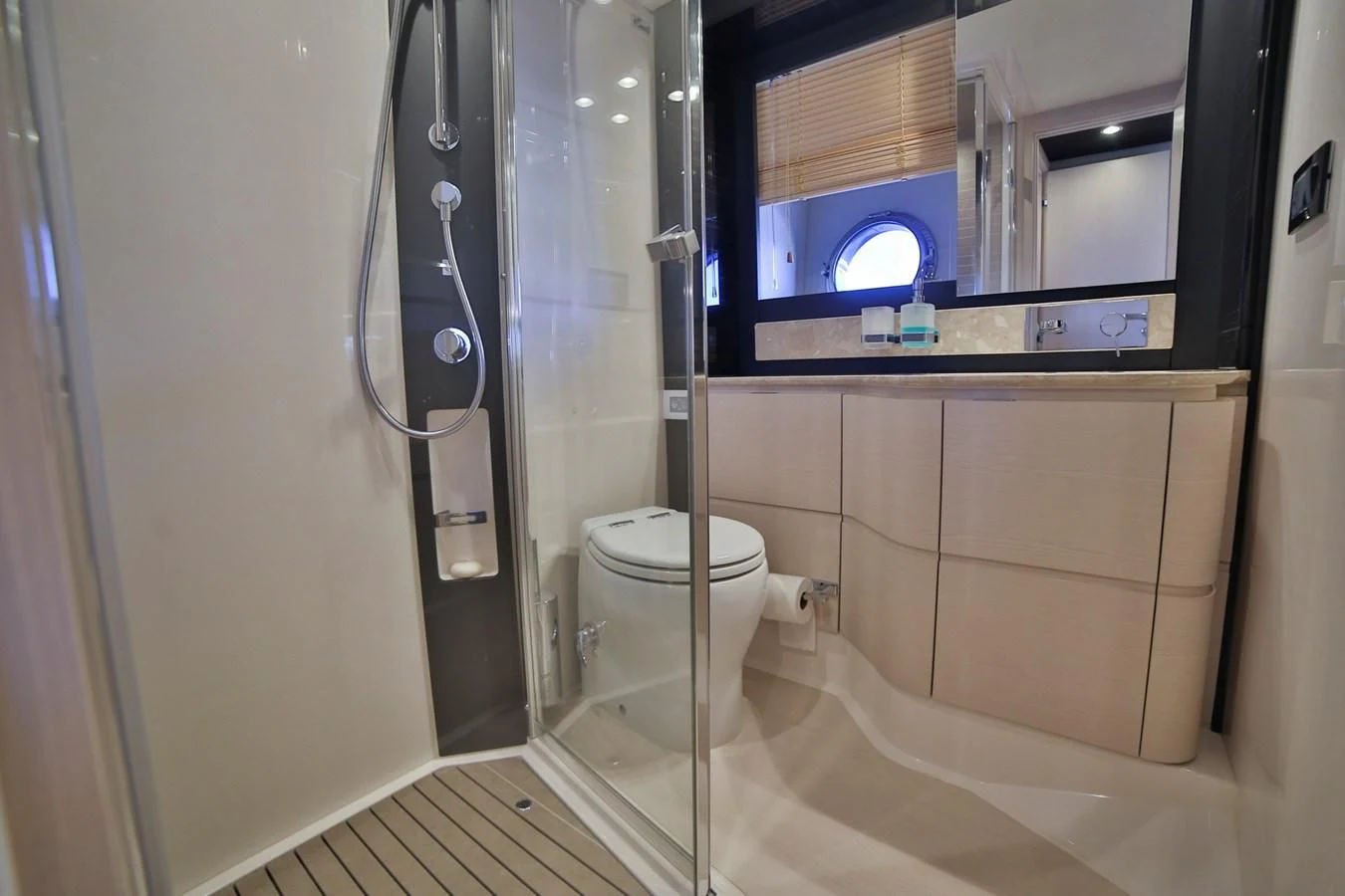 a bathroom with a glass shower aboard SIRONA JOANNAH Yacht for Sale