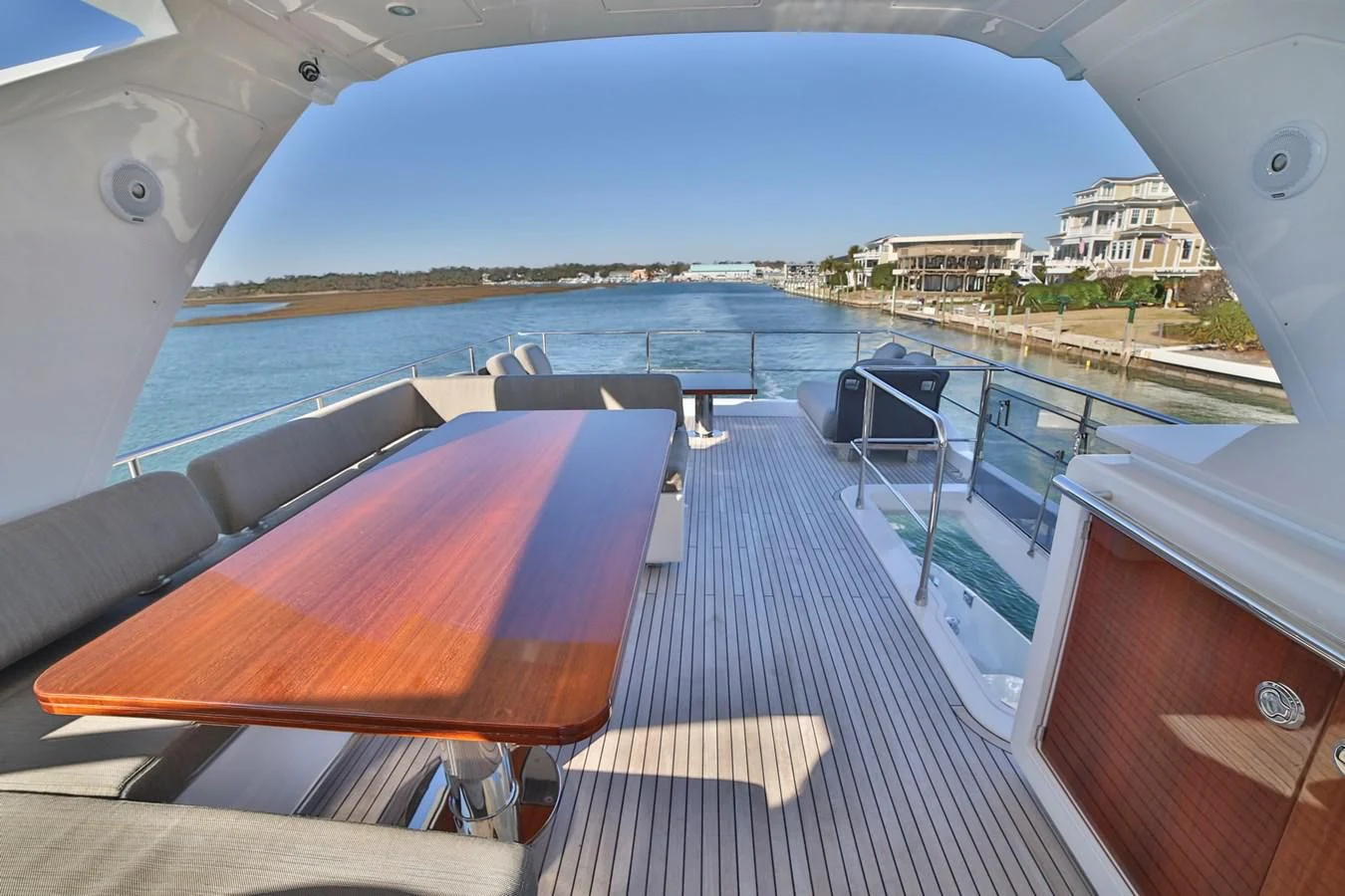a deck with a view of the water and a city aboard SIRONA JOANNAH Yacht for Sale