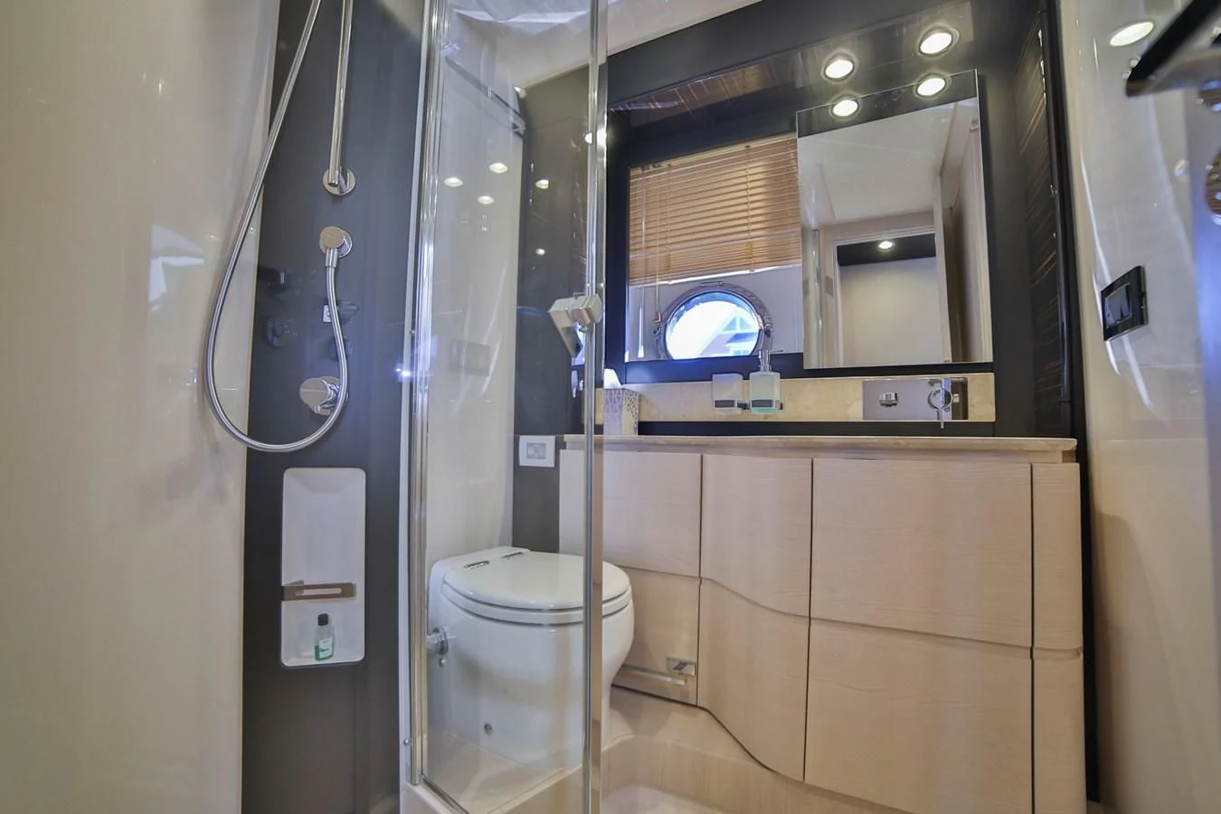 a bathroom with a glass shower aboard SIRONA JOANNAH Yacht for Sale