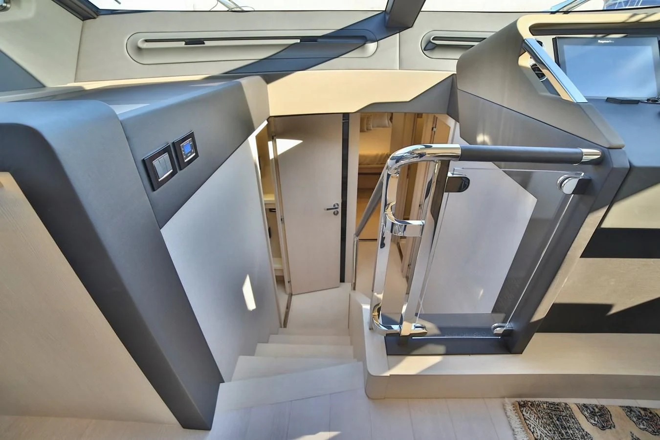 a car with doors open aboard SIRONA JOANNAH Yacht for Sale