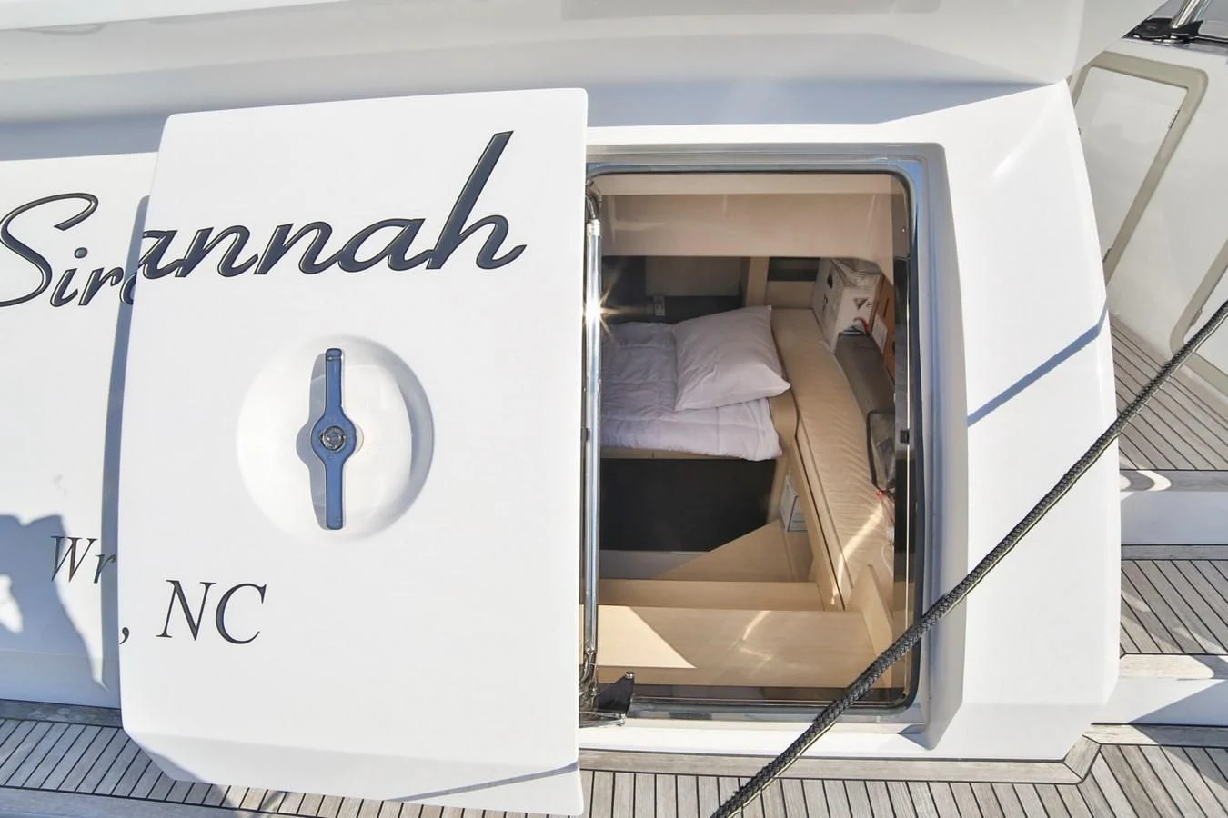 a sign with a picture of a person in a white box aboard SIRONA JOANNAH Yacht for Sale