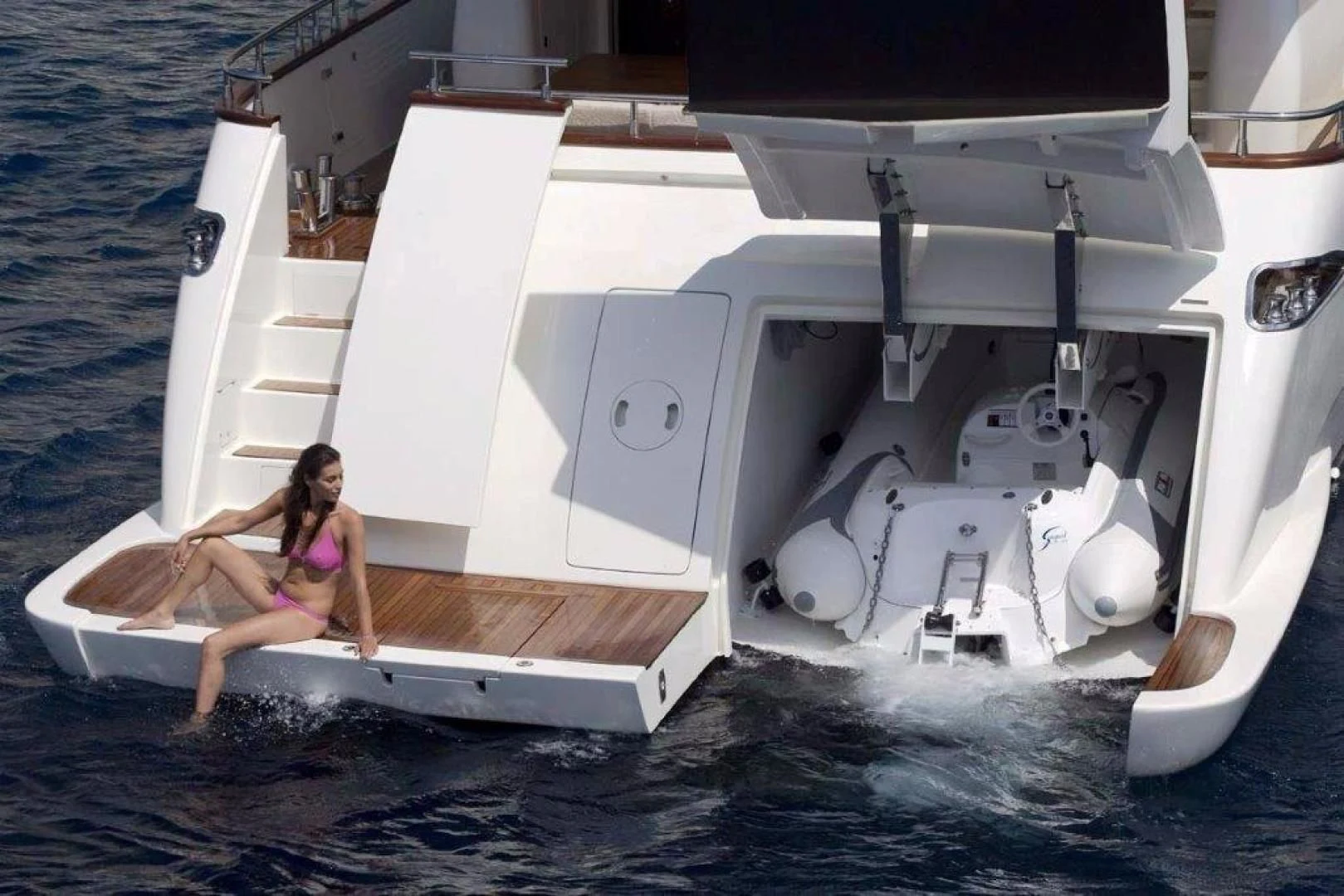 a person sitting on a boat aboard ELLISIUM Yacht for Sale